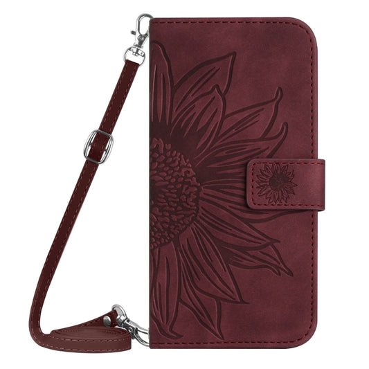 For iPhone 16e Skin Feel Sun Flower Embossed Flip Leather Phone Case with Lanyard(Wine Red) by bashfashion