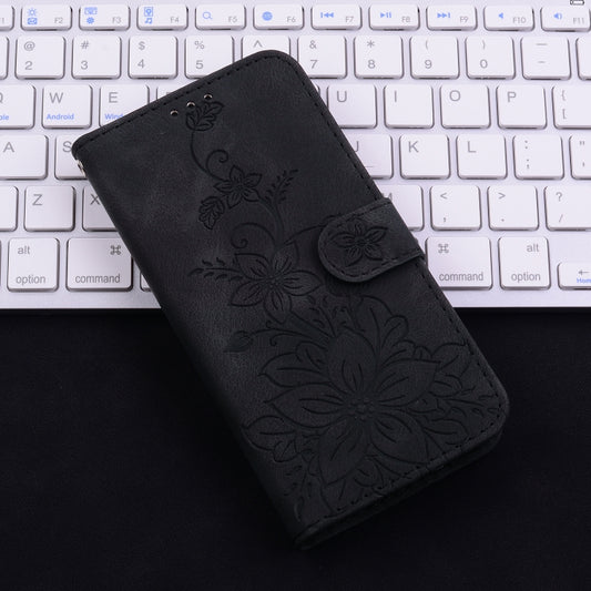 For iPhone 16e Lily Embossed Leather Phone Case(Black) by bashfashion
