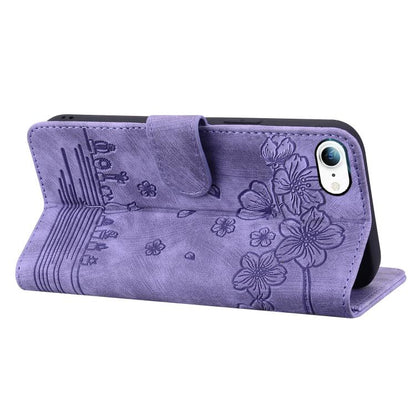 For iPhone 16e Cartoon Sakura Cat Embossed Leather Phone Case(Purple) by bashfashion