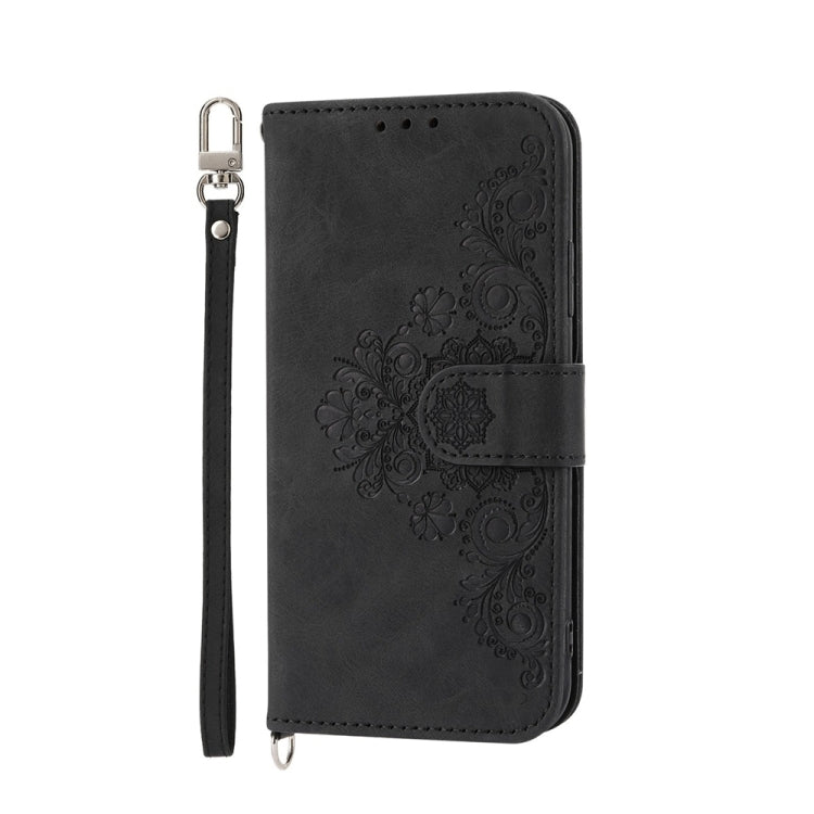 For iPhone 16e Skin-feel Flowers Embossed Wallet Leather Phone Case(Black) by bashfashion