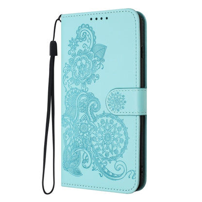 For iPhone 16e Datura Flower Embossed Flip Leather Phone Case(Light Blue) by bashfashion