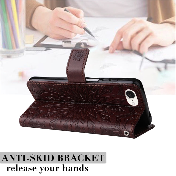 For iPhone 16e Embossed Sunflower Pattern Flip Leather Phone Case(Brown) by bashfashion