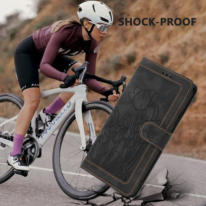 For iPhone 16e Tulips Embossed Leather Phone Case with Lanyard(Black) by bashfashion