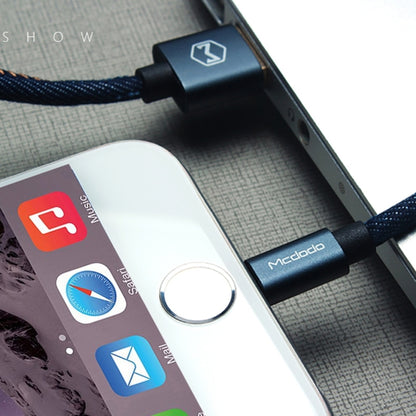 Mcdodo CA-1730 1.2m 2.4A Reversible 8 Pin to USB Denim Cover TPE Jacket Data Sync Charging Cable with Aero Aluminum Head for iPhone, iPad (Denim Blue) by Mcdodo