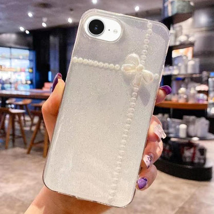 For iPhone 16e Pearl Bow Glitter Epoxy TPU Phone Case(Cross Knots) by bashfashion
