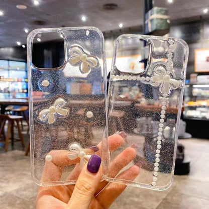 For iPhone 16e Pearl Bow Glitter Epoxy TPU Phone Case(Cross Knots) by bashfashion